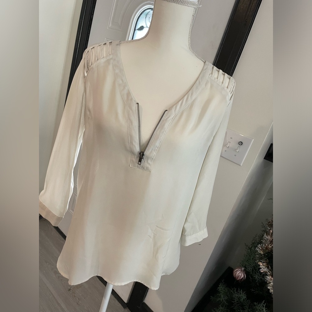 White blouse with cutouts